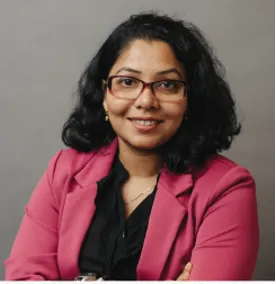 Two photos of a woman in a pink blazer, smiling, posing for a portrait.