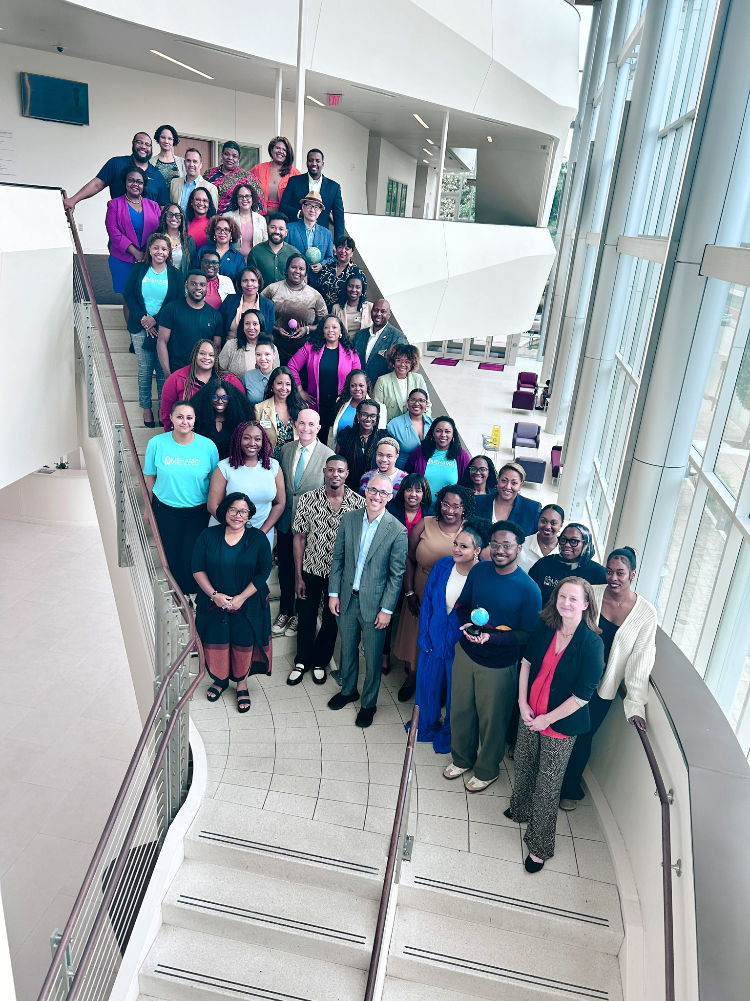 Group of people posing for a photo.