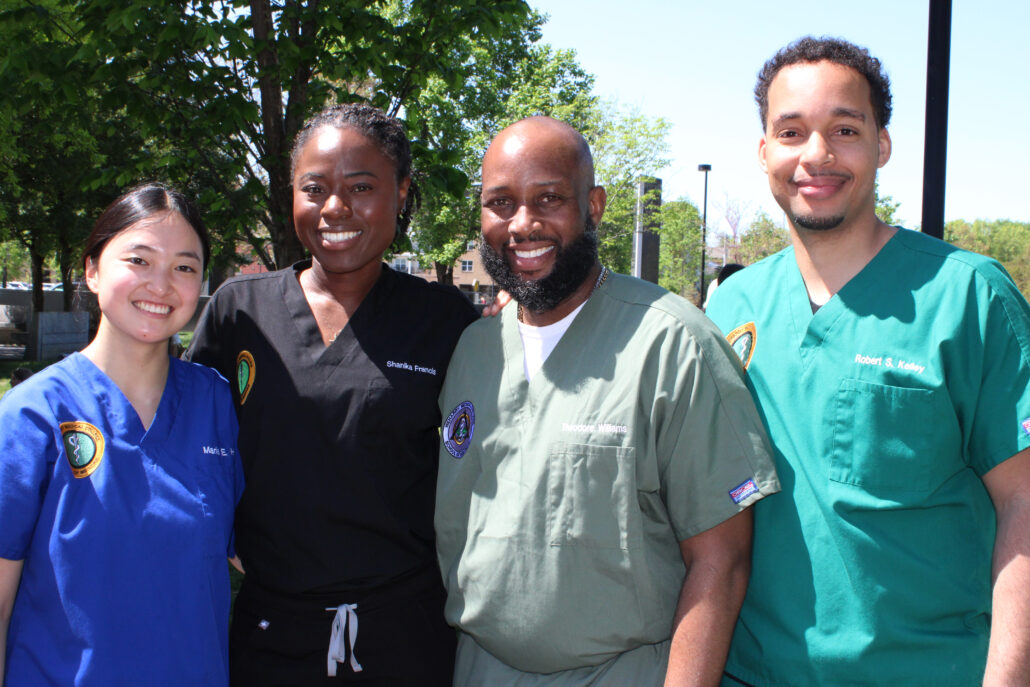 Group of people posing for a photo.
