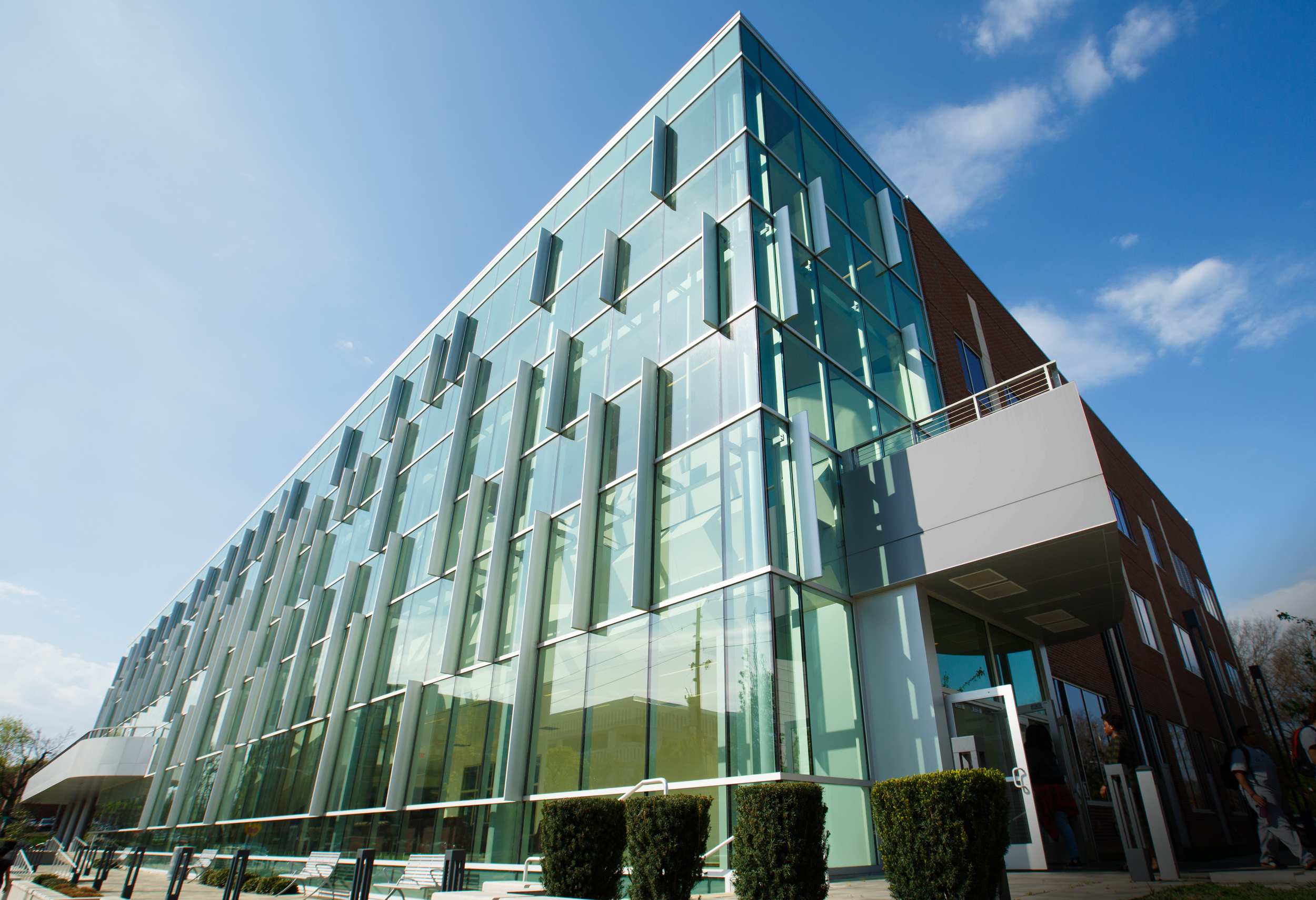 Modern building with large glass windows.