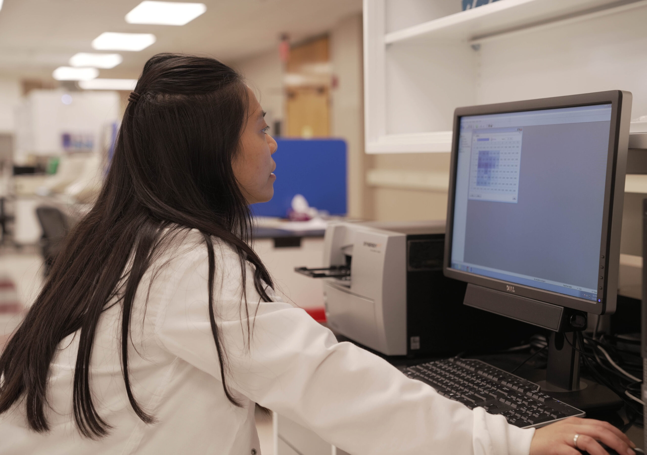 Two photos side by side: one of a woman working on a computer, the other of a woman looking at a computer screen.
