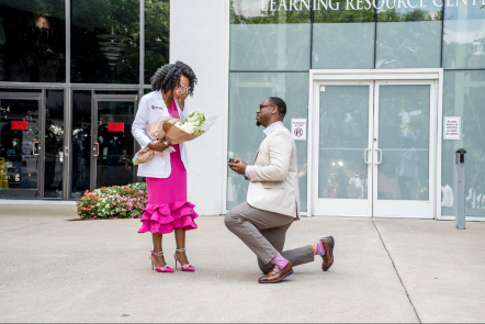 Couple getting married on street.