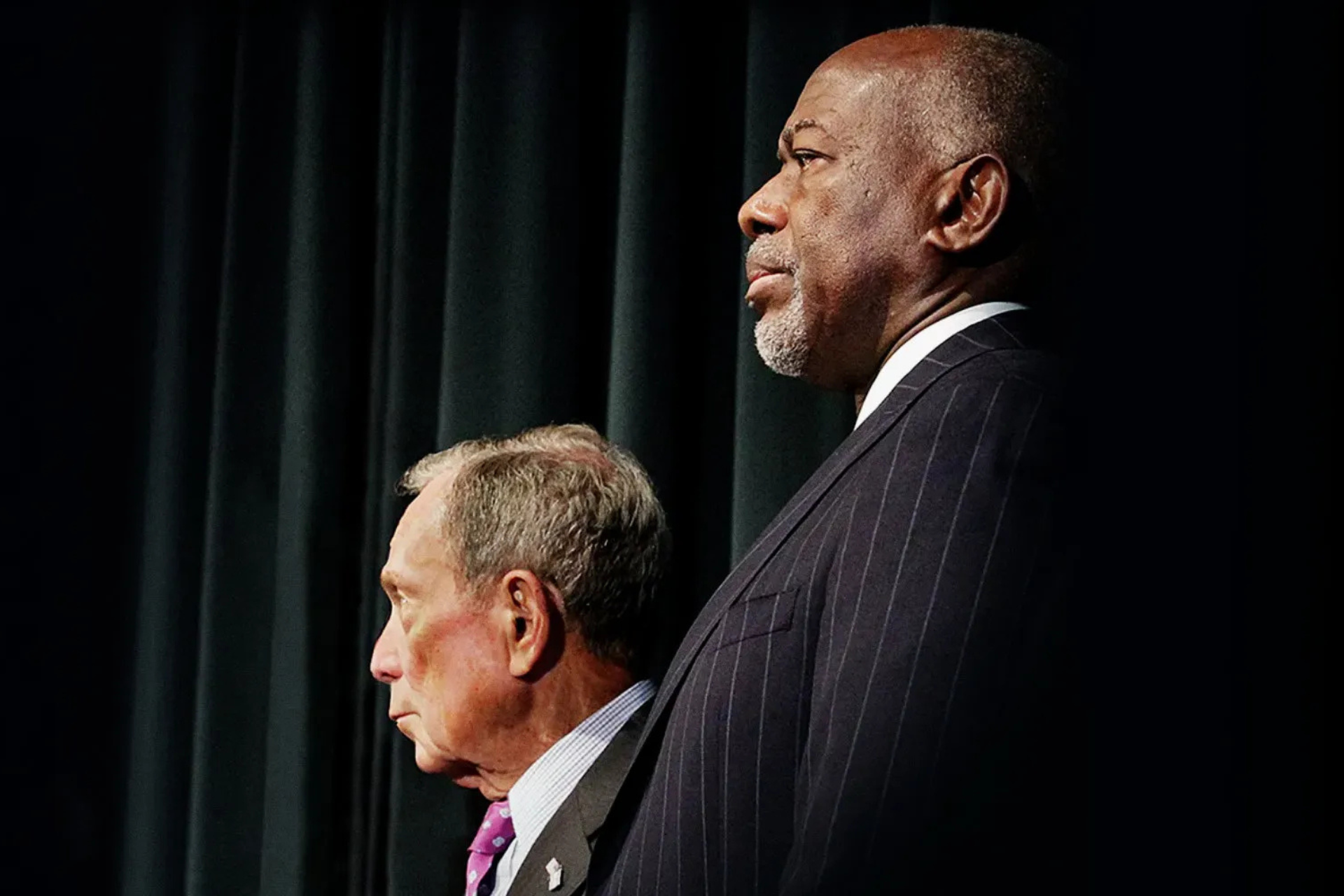 Two men standing at a podium.