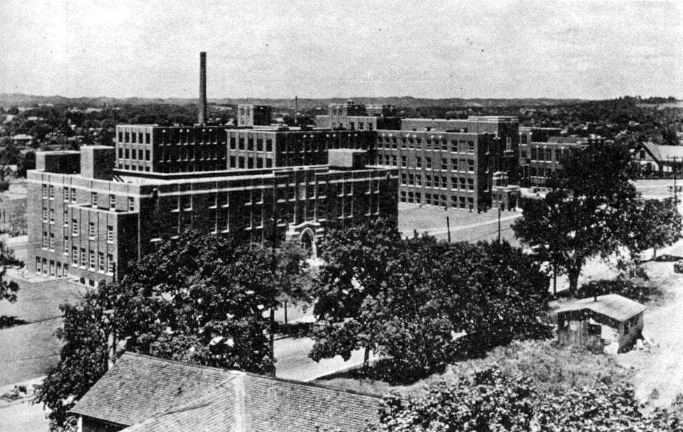 Black and white photo of a factory building.