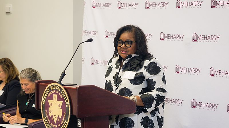 Dean Cherae Farmer speaking at an event