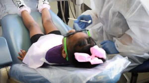 a child receiving dental treatment