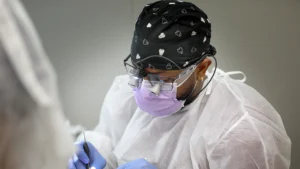 an action shot of a dentist at work