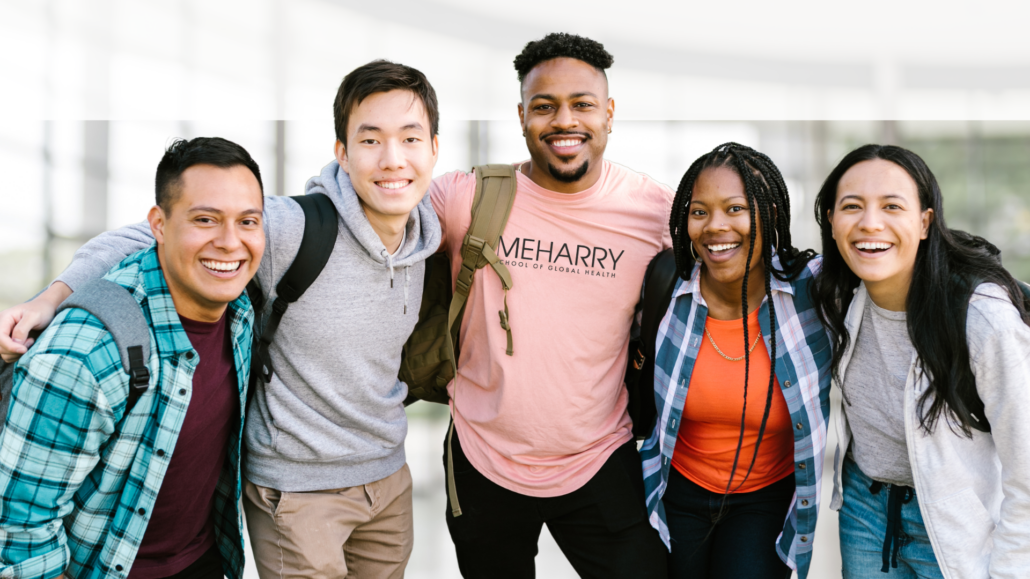 Group of people posing for a photo.