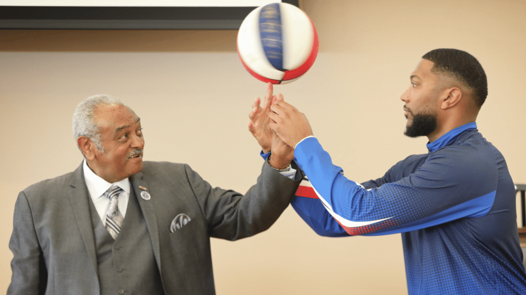 Student dentist Gilmore and Dr. Tyus.