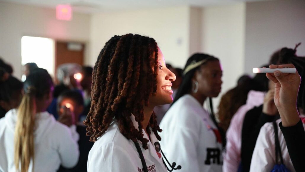 Young woman getting eye exam.