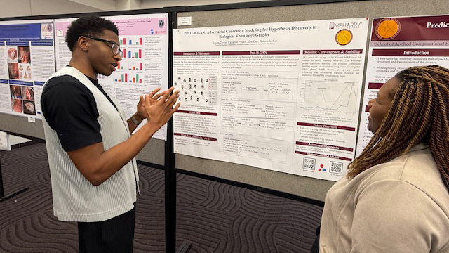 Jayl;in Victoria presenting his research.