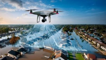Aerial drone flying over a flooded neighborhood.